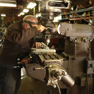 Machinist at Work on Barrier Product